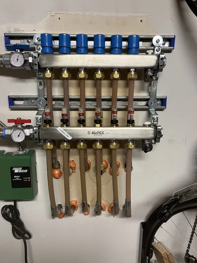 Plumber performing Water Heater Repair at a residential property in Plainfield